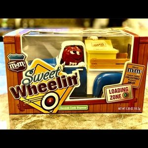 M&M sweet wheelin choclate candy dispenser